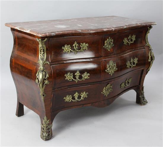 A Louis XVI ormolu mounted kingwood bombe commode, W.4ft 3in. D.2ft 2in. H.2ft 11in.